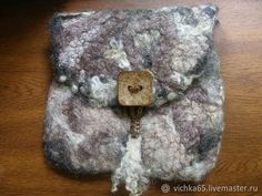 a stone with a key attached to it