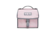 a pink and grey lunch bag with the word yeti on it's side