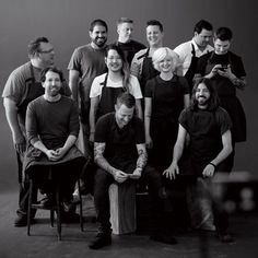 a group of people posing for a black and white photo