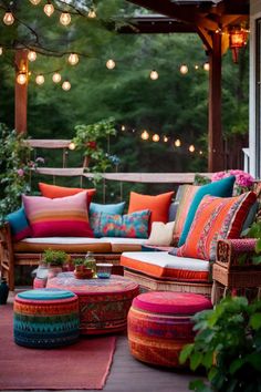 an outdoor seating area with colorful cushions and pillows