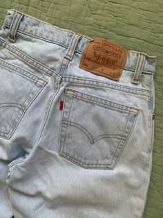 Vintage Levi's 550 light wash jeans from the 1990s with tapered legs, relaxed fit and a high waist. In overall great condition, no flaws to note. Fits best a 24 in to 25 in waist. Measured flat: Waist 12" - 12.5" pulled Rise 10" Hips 18" Inseam 31.5" Leg opening 5.5" PLEASE READ! *MEASUREMENTS* All items are measured while laying flat and unstretched. For clothing: chest, waist, hip and thigh measurements should be multiplied by two. All measurements are in inches. *VINTAGE CONDITION* Vintage goods may show signs of wear and age. We always indicate and/or show in pictures any major flaws or blemishes, but will not always mention small flaws, such as pinpoint sized spots or holes. If you are concerned about a particular item's condition, please message us. All of our pieces are pre-owned. W Levis Vintage, Levis 550, Light Wash Jeans, Wash Jeans, Vintage Levis, 12 12, Tapered Legs, Denim Pants, Levi's