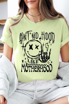 Mom Ain't No Hood Like Motherhood Funny Mothers Day Graphic T Shirts.Unisex Crew Neck Short Sleeve Tees.Crafted from premium materials, tailored to your lifestyle, ensuring a comfortable fit for any occasion.Family Group Uniforms Birthday Party Gift Concert Festival Events.High Quality Direct To Film Printed Graphic Design.100%COTTON,HEATHER(52%COTTON,48%POLY),ATH.HEATHER,BLACK HEATHER(90%COTTON,10%POLY)NICARAGUAMade In: Nicaragua Motherhood Silhouette, Event Shirt Design, Mother’s Day Shirts, Funny Shirt Ideas, Bar Shirts, Mothers Day Graphic, Occasional Outfits, Cool Mom Shirts, No Hood Like Motherhood