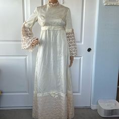 Incredible Estate Sale Find In Euvc Age Yellowing But No Visible Stain. Small Tear To Crinoline In The Sleeve Can’t Be Seen When Worn. Cream Vintage Dress For Wedding, Cream Vintage Floor-length Wedding Dress, Cream Floor-length Vintage Dress For Wedding, Cream Floor-length Vintage Wedding Dress, Vintage Beige Dress For Wedding Night, Vintage Full Length Dress With Lace Trim, Vintage Empire Waist Dress For Wedding, White Fitted Vintage Victorian Dress, Fitted Vintage Victorian A-line Dress