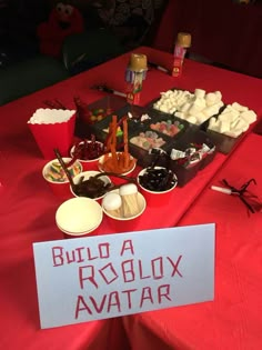 a red table topped with lots of food