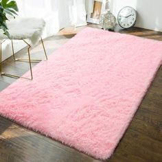 Lochas Soft Shaggy Rug Plush Modern Indoor Area Rugs Fluffy Floor Carpet for Living Room Home Decor Nursery, 4'X6',Pink Lochas Area Rug has the capability to brighten any room with a lively pop of color. In addition, the fluffiness will make any space feel comfortable and provide it with warmth. After a busy day, rug can make your feet feel soft, keep your feet off the cold ground, and give you the feeling of walking on clouds. The rug also acts as a muffler, filling your home with tranquility a Fluffy Bedroom, Girls Room Rugs, Nursery Carpet, Dorm Living Room, Pink Carpet, Plush Area Rugs, Bedroom Rugs, Bedroom Area Rug, Fluffy Rug