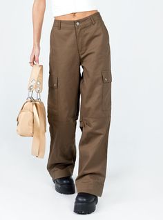 Cargo pants   Relaxed fit  Princess Polly Exclusive  Shell: 100% polyester   Lining: 95% polyester 5% elastane   Length of size US 4 / AU 8 waist to hem: 107cm / 42.1"    Elise is wearing a size US 2 / AU 6    Mid-rise   Zip & button fastening   Belt looped waist   Classic hip pockets   Press button leg & back pockets  Wide leg   Non-stretch  Unlined Cargo Pants Brown, Festival Pants, Baby Crop Top, Pink Formal Dresses, Coachella Outfit, Pants Brown, Lululemon Tops, Sweatshirt Set, Brown Pants