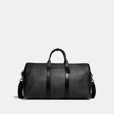 A bag as distinct as its namesake city the Gotham is a sleek streamlined style designed for travel. A no-fuss carryall this generously-sized (TSA compliant) Duffle features interior zip and slip pockets for easy organization and a convenient exterior pocket for access to essentials. Crafted of refined leather and our Signature canvas it’s secured by a zip closure and finished with a detachable strap for shoulder or crossbody wear. | Coach Gotham Duffle Bag In Signature Canvas - Black Copper/char Black Luxury Travel Accessories For On-the-go, Classic Coated Canvas Shoulder Bag With Luggage Sleeve, Designer Weekender Bag With Luggage Sleeve, Classic Coated Canvas Travel Bag For Formal Use, Classic Coated Canvas Travel Bag For Formal Occasions, Classic Formal Travel Bag In Coated Canvas, Classic Luggage With Leather Trim For Daily Use, Classic Weekender Bag With Leather Trim For Business Trips, Coach Business Bag With Zipper Closure