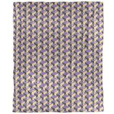 a purple and yellow blanket with squares on it