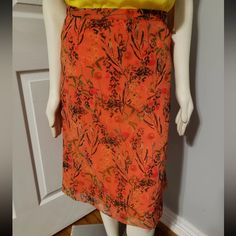 Elevate Your Bohemian Style With This Stunning Gianni Bini Floral Midi Skirt In Vibrant Orange. The Skirt Features A Flattering A-Line Silhouette With A Mid-Rise Waist And Knee-Length Hemline. The Floral Pattern And Sheer Lining Add A Touch Of Femininity And Elegance To The Piece, Making It Perfect For Any Occasion. The Skirt Has A Convenient Zip Closure And Requires Dry Cleaning Only For Garment Care. Whether You're Dressing Up For A Special Event Or Keeping It Casual For A Daytime Outing, This Orange Midi Skirt For Spring, Flowy Orange Skirt For Spring, Casual Orange Pencil Skirt, Orange Lined Midi Skirt, Orange Floral Print Skirt, Orange Flowy Skirt For Spring, Bohemian Orange Floral Print Skirt, Spring Orange Relaxed Skirt, Spring Orange Relaxed Fit Skirt