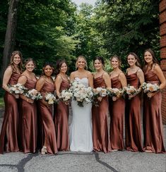 a group of women standing next to each other