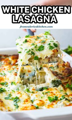 white chicken lasagna in a casserole dish being lifted with a spatula