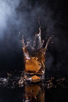 Whiskey splash reflection with smoke Whiskey Bottle Photography, Still Lives Photography, Whiskey Photoshoot, Bourbon Photography, Compass Photography, Replica Surfaces