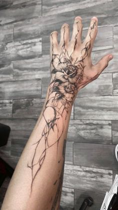 a person's arm with a tattoo on it