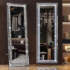 two mirrored mirrors in the middle of a room