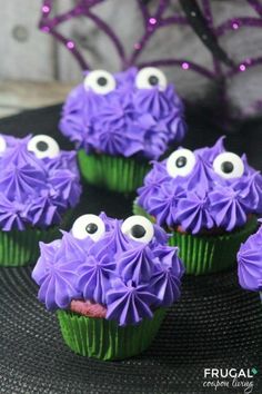 cupcakes decorated with purple frosting and googly eyes