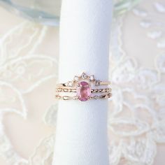 One of a kind (only 1 ring available in each gold color) unheated natural pink sapphire ring is made of 100% recycled 14k gold with a choice of solid 14k yellow, rose, and white. The ring features clean and sparkly unheated natural unheated purple sapphires, perfect to wear on a special occasion or as a unique engagement ring. 7x5mm approx. 0.4ct unheated natural pink or purple sapphire (not synthetic, not lab created) Band width: approx. 1.5mm High profile four prongs flower setting Made with 1 Delicate 14k Gold Pink Ring, Delicate Pink 14k Gold Rings, Delicate Pink Rings With Rose Cut Diamonds, Dainty Sapphire Ring In Rose Gold, Dainty 14k Gold Oval Sapphire Ring, Elegant Pink Stackable Rings In 14k Gold, Pink 14k Gold Stackable Wedding Rings, Dainty 14k Gold Pink Ring, Elegant Pink 14k Gold Stackable Rings