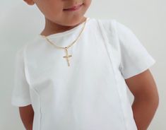 Children's Gold Cross Necklace, Gold Kids Dainty Cross Necklace, Baptism Gift for Him,  Toddler Baby Boy, Cross Unisex Cross ---------------------------------------------------------------------------------------- ♥ It comes packaged ready for gift giving :).  ♥ DETAILS - Material: 18k Gold Filled  - Nickel free hypoallergenic for sensitive skin - Lightweight, perfect for everyday wear ♥ SHIPPING  All orders will be shipped out within 1 business days after the order has been received. Orders shi White Cross Pendant Necklace For Baptism, White Cross Necklace For Baptism, White Crucifix Necklace For Baptism, White Cross Necklace For First Communion, Cross Necklace Gold, Dainty Cross Necklace, Toddler Baby Boy, Gold Cross Necklace, Orders Shipped