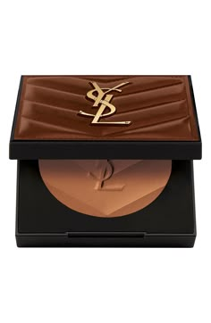 What it is: A YSL bronzer that's soft with a subtle shimmer and comes in a couture clutch. This bronzer leaves skin with a 24-hour healthy, sun-kissed glow.What it does: This breathable, buildable and buttery-smooth bronzer blends seamlessly on skin, leaving a natural sheen and subtle shimmer. There's no fading or shifting. Powered with hyaluronic acid and niacinamide, this skin-loving bronzer is noncomedogenic and fragrance-free. It's available in five skin-adaptable shades. How to use: For glo Ysl Makeup, Yves Saint Laurent Makeup, Bronzer Makeup, Expensive Makeup, Makeup Shades, Ysl Beauty, Bronzing Powder, Makeup Bronzer, Glowy Skin