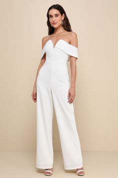 The Lulus My Favorite Night Ivory Off-the-Shoulder Jumpsuit will be your new go-to for an impressive night out look! Stretchy crepe knit fabric shapes a notched, off-the-shoulder neckline (with internal V-bar support and hidden no-slip strips) and a darted bodice with an elegant overlay that flows into short sleeves. High, fitted waist sits atop wide pant legs that fall to full-length hems. Hidden back zipper/clasp. Fit: This garment fits true to size. Length: Floor length. Size medium measures Ivory Jumpsuit, Wedding Top, Casual Wedding Dress, Wide Pants, Wide Leg Jumpsuit, Spring Outfits, Floor Length, Off The Shoulder, Knit Fabric