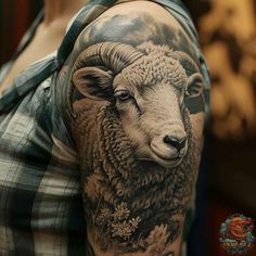 a woman with a goat tattoo on her arm