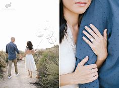 a man and woman walking down a dirt road holding each other's arms as they hold hands