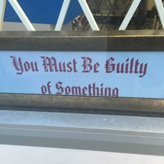 there is a sign that says you must be bully of something in the window