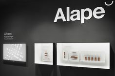 a display case with three different items on it's sides and the words alpe written above them