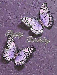 two purple butterflies with the words happy birthday on them