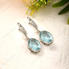 Aquamarine Earring    Large Oval cut Aquamarine dangle, Ocean blue gemstone drop earrings, gift for her, gift for mom, March birthstone,925 Sterling Silver Dangle  teardrop  created Gemstone earrings gemstone-10x14mm <> Some basic benefits of wearing Aquamarine Gemstone: Attracts money. Brings good fortune. Financial abundance. Protects from negative energies. Cleanses all evil thoughts. Stability in married life. Improves communication. Boosts self-confidence. FREE SHIPPING AND USPS TRACKED PARCELS WORLDWIDE. Our products are totally handmade and made with high quality gemstones and 925 solid sterling silver If you believe in buying top quality products for yourself and for your family and friends, SE is the place where you want to be There are unique pieces, handcrafted to perfection wit Elegant 925 Stamped Drop Earrings, Elegant Drop Earrings Stamped 925, Elegant Round Topaz Earrings, Fine Jewelry Aquamarine Earrings For Formal Occasions, Formal Aquamarine Earrings Fine Jewelry, 925 Stamped Drop Jewelry For Anniversary, Elegant Blue Topaz Earrings For Anniversary, Elegant Sapphire Earrings With Topaz, Elegant Sapphire-colored Topaz Earrings