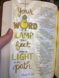 an open bible with the words your word is a lamp to my feet and a light path