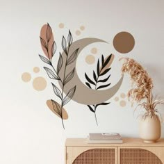 a wall decal with leaves and circles on it