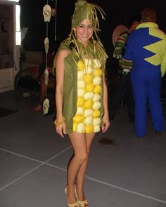 a woman in a costume made out of fruit