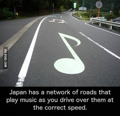 an image of a road that has a musical note painted on it with the words japan has a network of roads that play music as you drive over them at the correct