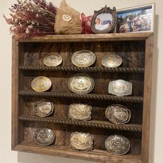 a wooden shelf with many plates on it