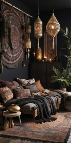 a living room filled with lots of furniture and hanging lights on the wall next to a rug