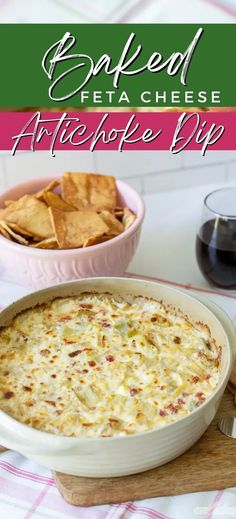 an artichoke dip in a casserole dish with chips on the side