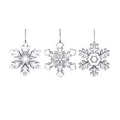 three snowflakes hanging from the ceiling