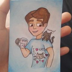 a drawing of a boy holding a cat and a cupcake in his hand with the caption i love cats