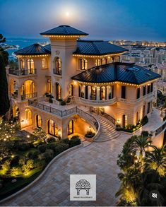 an aerial view of a mansion at night