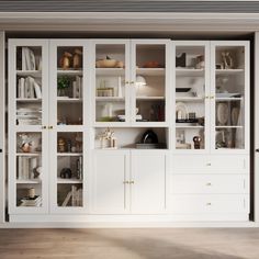 a white bookcase filled with lots of books