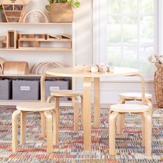 the table and chairs are all made out of plywood, which is used for storage