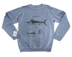 Original blue marlin anatomy design screen printed onto a high quality crewneck sweatshirt. Each sweatshirt is twined and tagged giving a nautical presentation. Perfect for any fish enthusiast. Sweatshirt stats: * Original design * Water based inks * 80% ringspun cotton & 20% polyester * Soft washed garment dyed fabric * 1x1 rib on collar, cuffs, and waistband * Double-needle collar * Twill taped back neck * Rolled-forward shoulder * Backpatch * Double-needle holes All shirts are silk-screened h Blue Marlin, Earthy Outfits, Marine Biology, Water Design, Original Design, Graphic Shirts, Mens Long Sleeve, Sweat Shirt, Crew Neck Sweatshirt