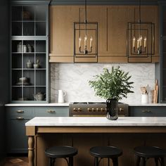 a kitchen with marble counter tops and wooden cabinets, along with stools that match the wood flooring