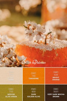 the color palette is orange, brown, and green with some white flowers on it