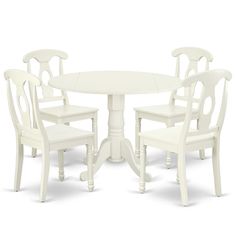 a white table and four chairs sitting next to each other