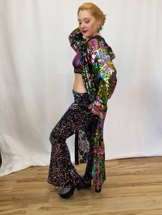 This long sleeve sheer coat is so magical! The multi-colored floral patterned sequins glisten & shimmer in the sun. The mesh foundation creates a lacey shadow when light shines through it! Sheer Coat, Mesh Robe, Sequin Duster, Sequin Kimono, Lace Jacket, Multi Colored, The Sun, Sequin, Foundation