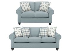 two blue couches with pillows on them