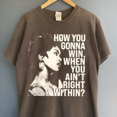 How you gonna win when you ain't right within, Lauryn music Hill, Lauryn T-shirt , Lauryn concert , Lauryn  fans Gift for men women t-shirt ABOUT MATERIAL: Comfort Colors® 1717 Made with medium fabric (6.1 oz/yd² (206.8 g/m consiting of high quality, 100% ring-spun US cotton for long-lasting comfort. The relaxed fit keeps the wearer comfy in both casual and semi-formal settings while the crew neckline delivers that classic, neat style which makes it perfect for accessorizing. What's more, the pr Lauryn Hill Shirt, Lauryn Hill Style, Outside Concert Outfit, Graphic T Shirt Outfit, Graphic Shirt Design, Music Merch, Neat Style, Movie T Shirts, Comfort Color