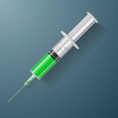 a medical syll with green liquid in it's end and an empty needle