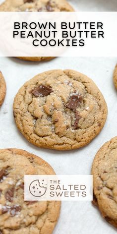 chocolate chip cookies on a baking sheet with the words brown butter peanut butter cookies above them